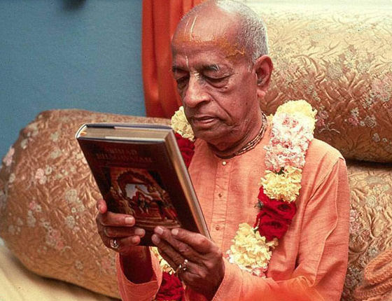 Srila Prabhupada reading his own books