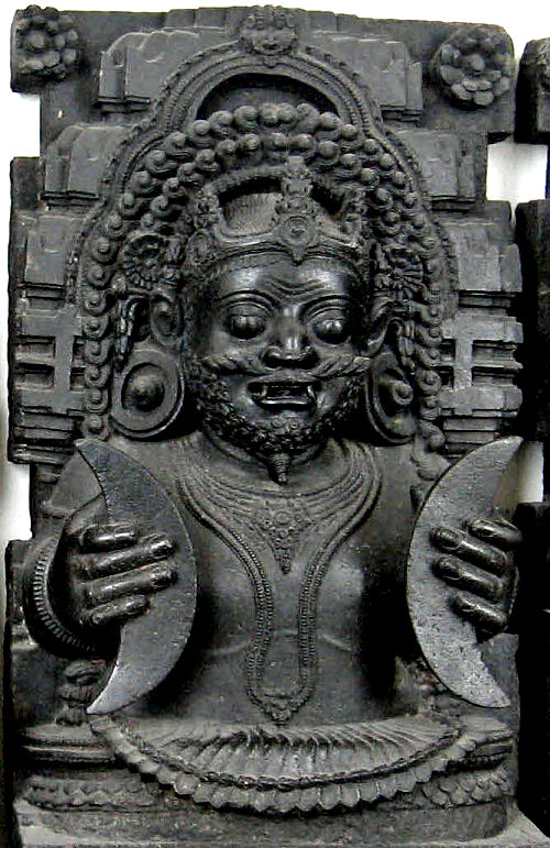 Demoniac Rahu trying to eclips the Sun and Moon