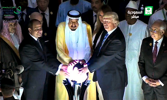 Donald Trump, Saudi King Salman bin Abdulaziz, and Egyptian President Abdel Fattah el-Sisi holding a creepy glowing orb in a darkened room in Saudi Arabia 